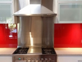 Red Glass Splashback teamed with Frosted Glass Door Inserts by Graphic Glass Services