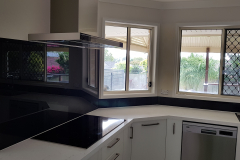Taubmans Black Jack coloured toughened glass splashback by Graphic Glass Services