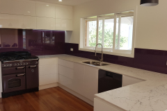 Colourback Glass Splashback in Dulux Punchit Purple  by Graphic Glass Services Qld