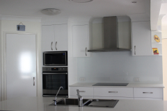 Colourback Glass Splashback in White 101 by Graphic Glass Services Qld