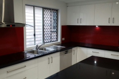 Red Oceanic Glass Splashback by Graphic Glass Services Qld