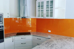 Stunning Sunrise Orange Colourback Glass Kitchen Splashback by Graphic Glass Services Qld
