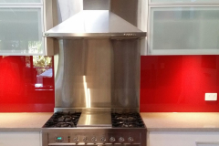 Red Glass Splashback teamed with Frosted Glass Door Inserts by Graphic Glass Services