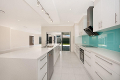 Colourback Glass Kitchen Splashback in Tropical Splash by Graphic Glass Services Qld