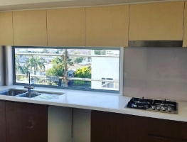 Colourback Glass Splashback in Bone White by Graphic Glass Services Qld
