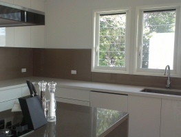 Colourbacked Glass Splashback in Bronze Metallic by Graphic Glass Services Qld