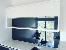 Grey Toughened Mirror Glass Kitchen Splashback by Graphic Glass Services Qld