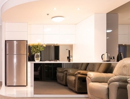 Smoky Grey Toughened Mirror Splashback and Island Bench Front by Graphic Glass Services Qld