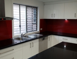 Red Oceanic Glass Splashback by Graphic Glass Services Qld