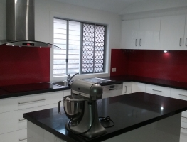 Red Colourbacked Patterned Glass Kitchen Splashback by Graphic Glass Services Qld
