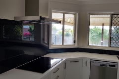 Taubmans Black Jack coloured toughened glass splashback by Graphic Glass Services