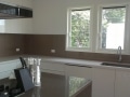 Colourbacked Glass Splashback in Bronze Metallic by Graphic Glass Services Qld