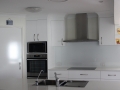 Colourback Glass Splashback in White 101 by Graphic Glass Services Qld