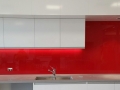 Red Colourback Glass Splashback by Graphic Glass Services Qld