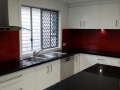 Red Oceanic Glass Splashback by Graphic Glass Services Qld