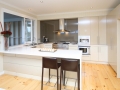 Glass Splashback in Seismic by Graphic Glass Services Qld