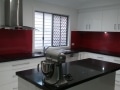 Red Colourbacked Patterned Glass Kitchen Splashback by Graphic Glass Services Qld
