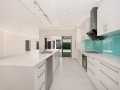 Colourback Glass Kitchen Splashback in Tropical Splash by Graphic Glass Services Qld