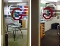 Glass Sliding Doors with Vinyl Logo by Graphic Glass Services