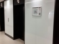 Lift Foyer Colourback Glass Wall Cladding by Graphic Glass Services Qld
