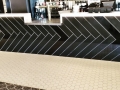 Black Herringbone Colourback Glass Panels by Graphic Glass Services Qld for the Qld Cricketers Club